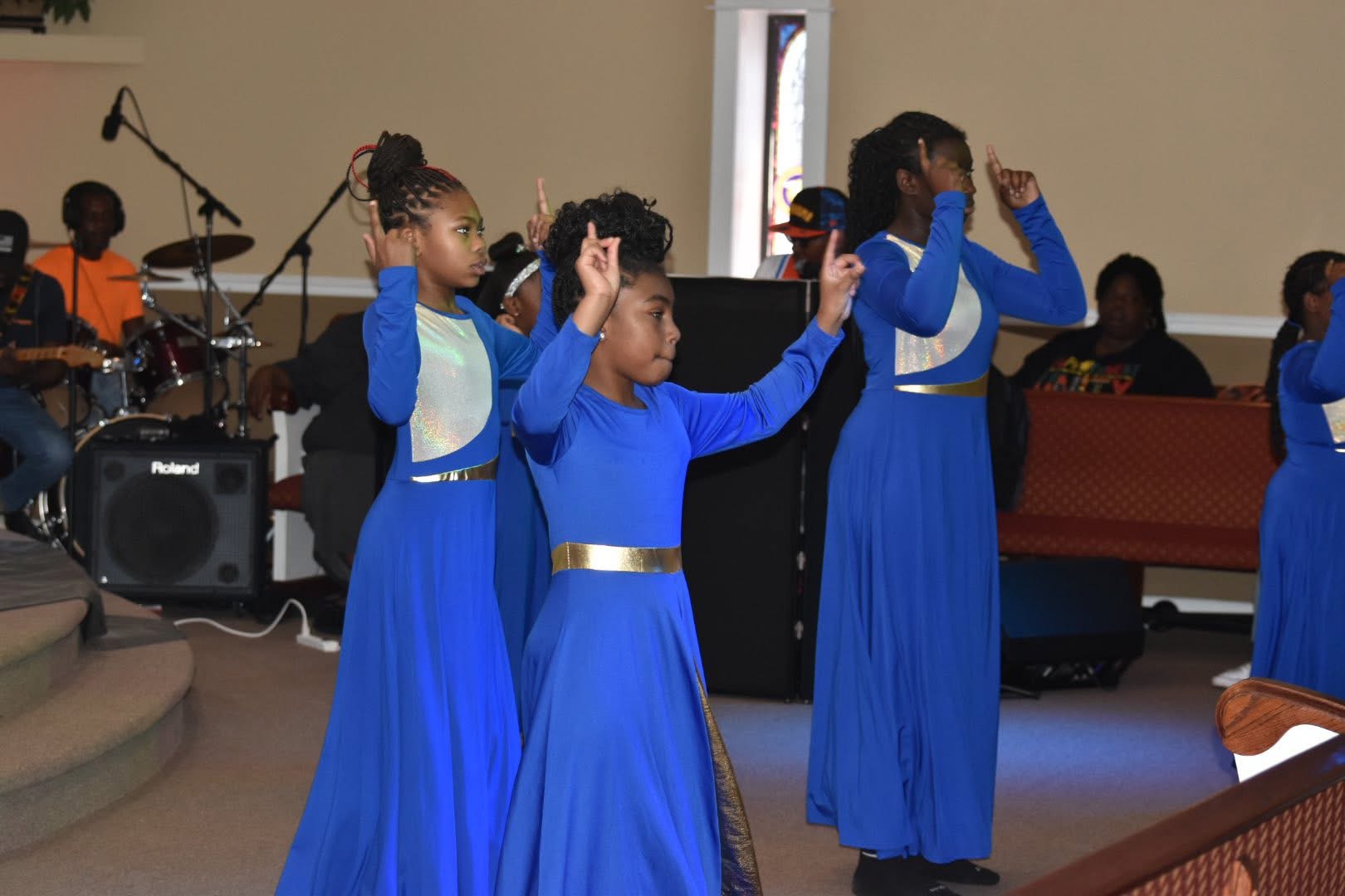 Children worshipping through dance