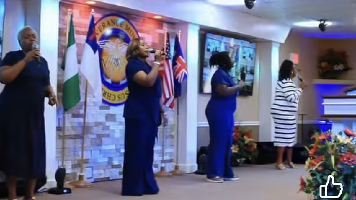 Praise team singing during worship
